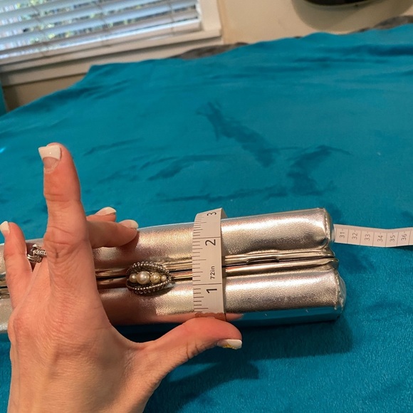 Chic Black Wristlet with Sleek Design and Metallic Accents - Picture 16 of 16